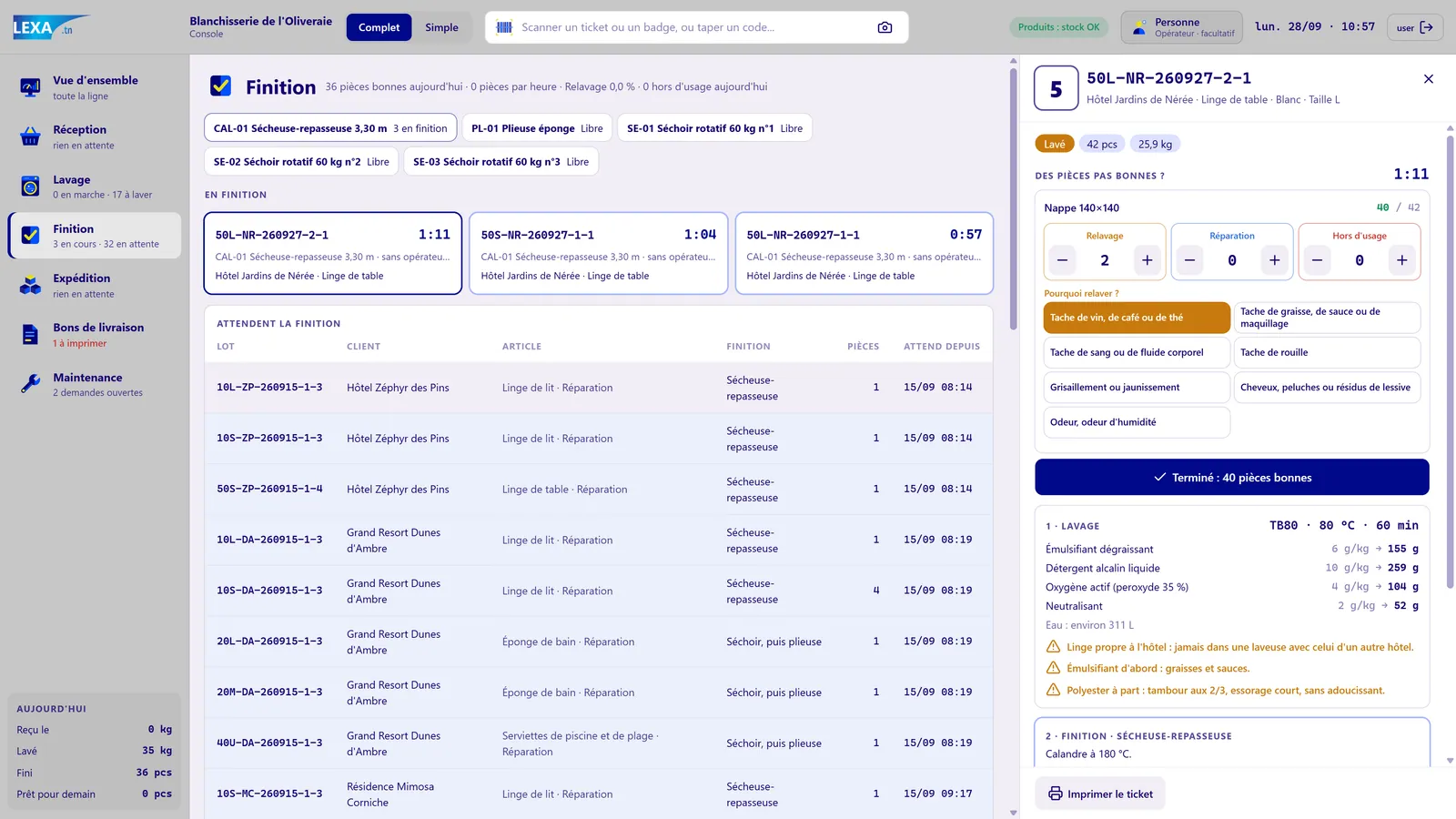 Poste de finition : lots en attente et déclaration des pièces à relaver, à réparer ou hors d'usage avec le motif